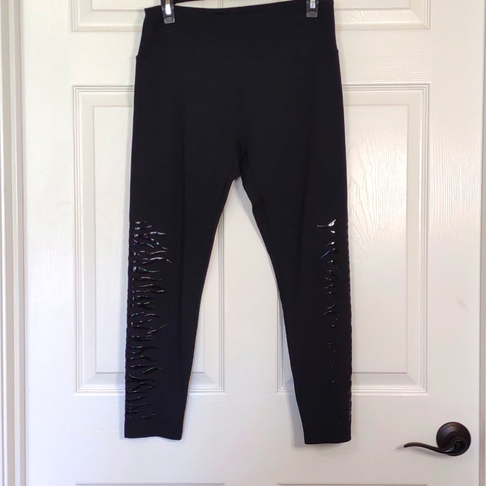 Marika black leggings size large, zebra striped pattern detailing